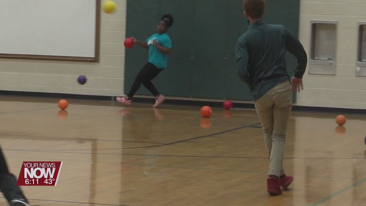 Students at Lima West Middle School playing dodgeball to help a student at Bath Elementary School
